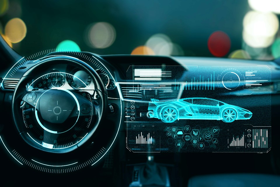 A car dashboard with a hologram of a car.